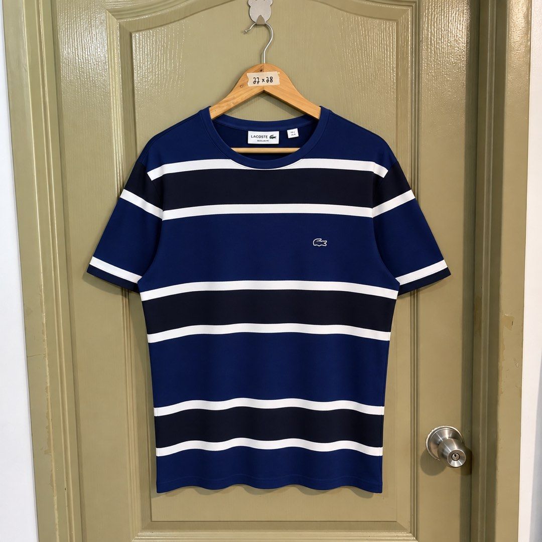Lacoste Style# TH3012 Tee (Category: Luxury Apparel) located in Makati City. Submitted by gustavoo28 (Listing ID 1465256673, Image 1). Description: Authentic/Legit No issues 10/10 Color Rate Excellent Condition Size 4 regular fit 22W 28L.