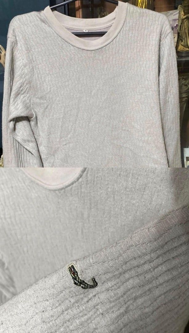Lacoste Textured Long Sleeve Sweater Grey (Category: Longsleeves) located in Tarlac. Submitted by jieunieee (Listing ID 1465192539, Image 2). Description: - Brand: Lacoste - Color: Grey - Style: Crewneck long sleeve thermal sweater - Design: Unique textured fabric pattern with ribbed cuffs and hem - Detail: Small embroidered crocodile logo on the sleeve cuff - Material: Comfortable, warm thermal knit - Condition: Excellent pre-loved condition.