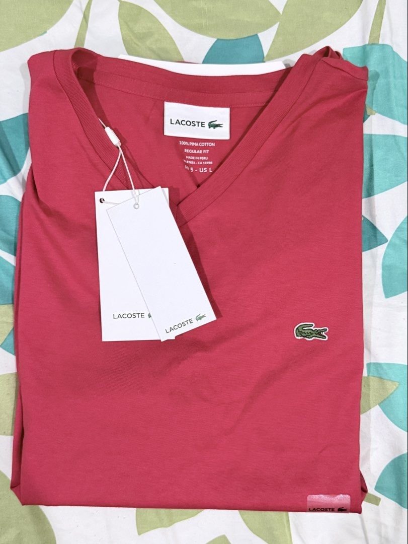 Lacoste VNeck Shirt (Category: Tshirts & Polo Shirts ) located in Quezon City. Submitted by happyquailegg (Listing ID 1465339595, Image 1). Description: Lacoste VNeck Shirt -Pima Cotton -Brand new Red -Regular Fit -Size 5 / Large ( 72cm x 54cm) -Original / Check all you want -With Lacoste Paper Bag RFS: wrong size ₱1,200 only Mode of Payment: BPI or Gcash Shipping: Lalamove or Grab Location: Alta Vista Homes, Reparo Rd. Caloocan City.