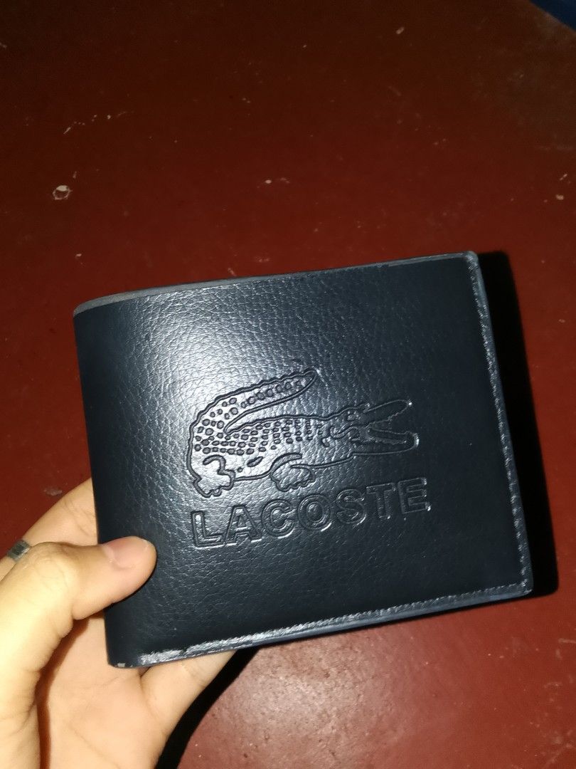 Lacoste wallet (Category: Activewear) located in Cavite. Submitted by zinnn. (Listing ID 1465316704, Image 1). Description: ayos na ayos pa kaysa nakatago bilhin nyo na aesthetic tignan Lalo pag naka Lacoste wallet.