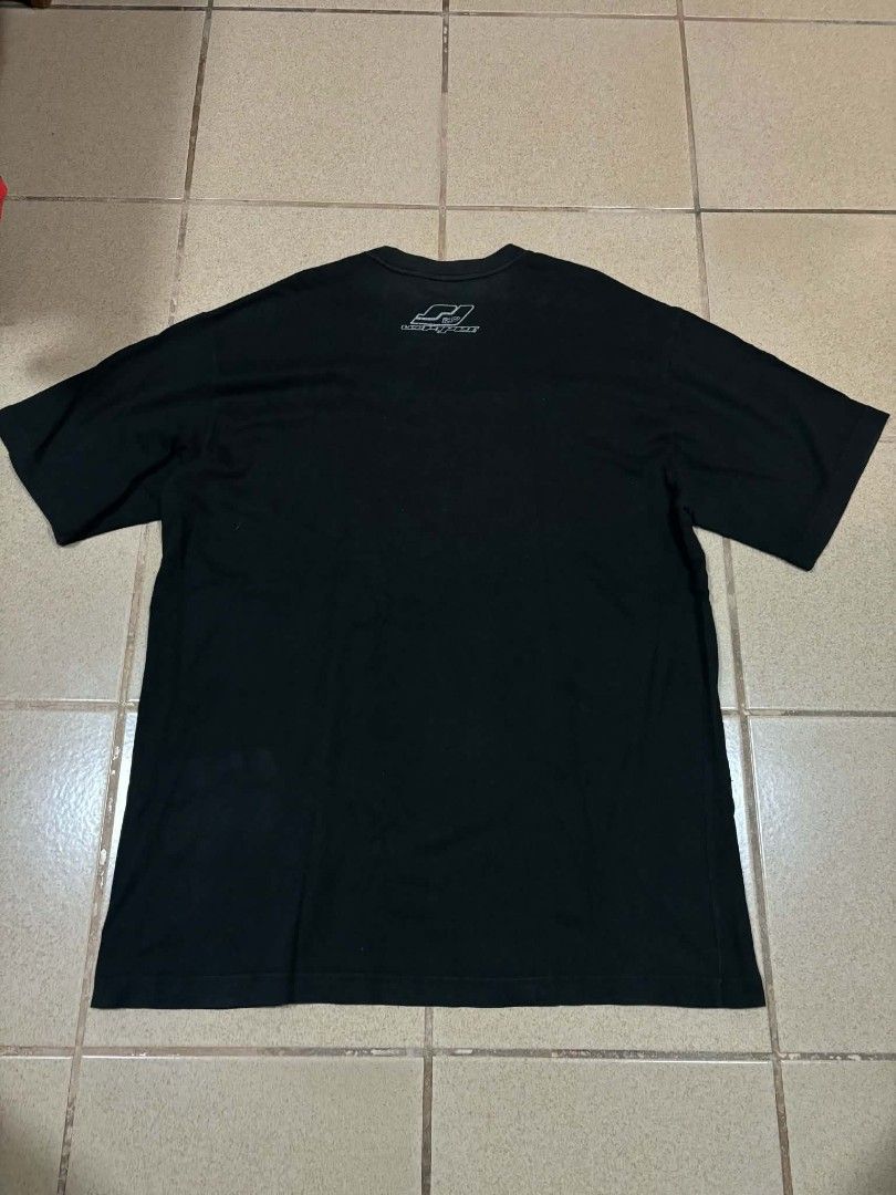Lee Pipes Black Graphic Tee Skull Y2K (Category: Tshirts & Polo Shirts ) located in Caloocan City. Submitted by joshuadyogi0122 (Listing ID 1465181887, Image 3). Description: - Brand: Lee Pipes - Color: Black - Size: Large - Design: Large skull and scroll front graphic with small back collar logo - Fit: Standard fit with classic crew neck - Details: Interior tag with care instructions included.