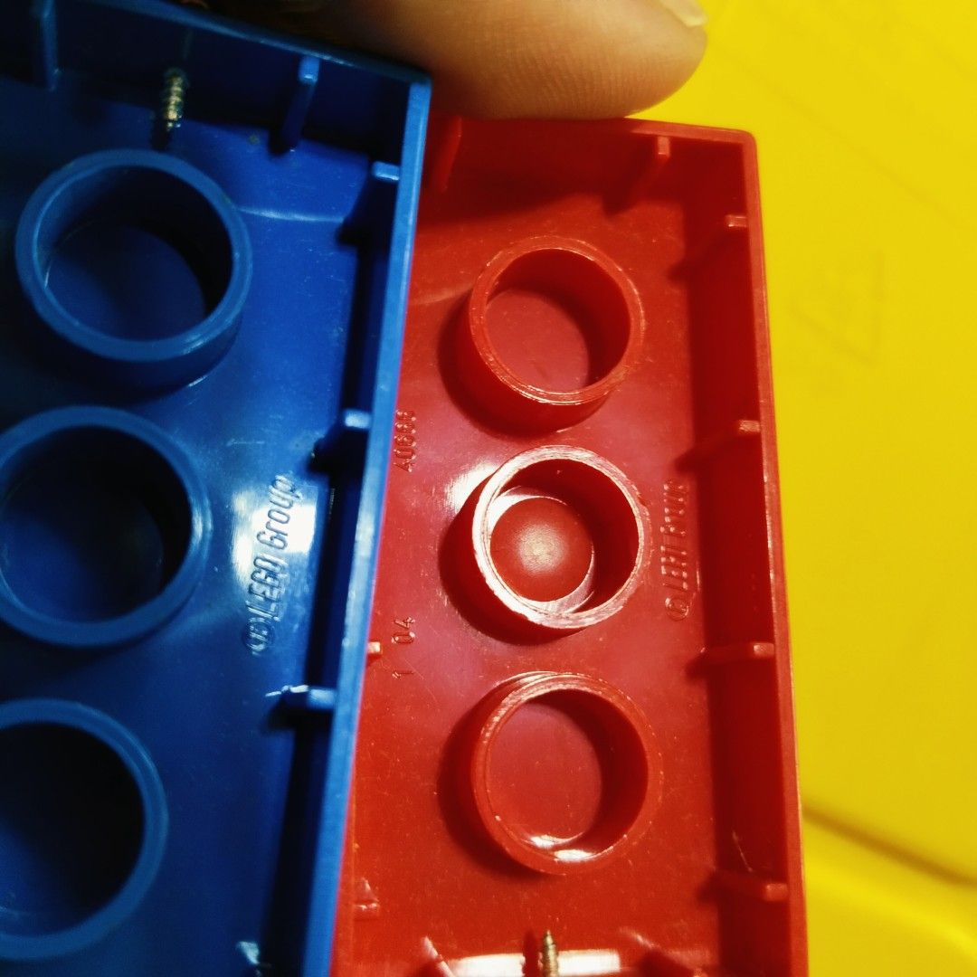 Original LEGO Duplo Modeled Keychains (Category: Lego & Building Sets) located in Pasig City. Submitted by babylove2003 (Listing ID 1465207280, Image 2). Description: Original LEGO with markings. LEGO Duplo markings keychains in blue, black, red, orange, yellow, green, lime green, and bright yellow. Each keychain is made from standard 2x4 LEGO bricks with an attached metal chain and ring. Great for keys or backpack charms. Sold individually or me