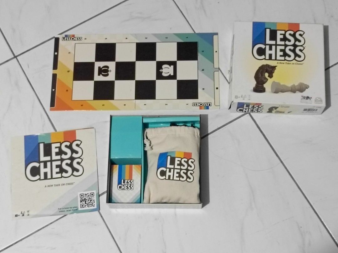 Less Chess Board Game (Spin Master) (Category: Board Games & Puzzles) located in Calbayog City. Submitted by thingsandstuff554 (Listing ID 1465301113, Image 2). Description: ​✅ Complete set (Board, pieces, cards, manual, pouch) ✅ Excellent condition pieces and board ❌ Outer box has a tear/shelf wear on the side.