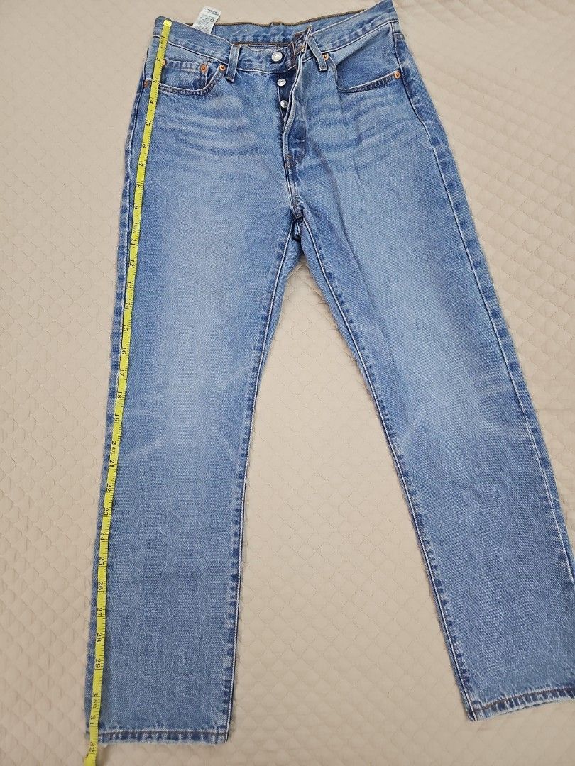 Levi's 501 Original Fit Jeans - Medium Wash (Category: Jeans) located in Muntinlupa City. Submitted by shoptitak (Listing ID 1464387650, Image 1). Description: - Classic Levi's 501 jeans - Medium blue wash denim - Button fly closure - Iconic five-pocket styling - Made in Cambodia - Essential wardrobe staple.