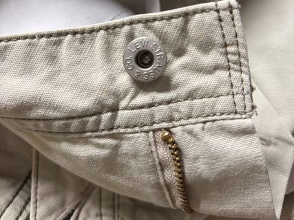 Levi's Khaki Mini Skirt Small 28-29" (Category: Skirts) located in Quezon City. Submitted by garagesale2026 (Listing ID 1465375899, Image 3). Description: - Used a few times - In very good condition - Original from Singapore - Length: 12" - Two back pockets and red stitching.
