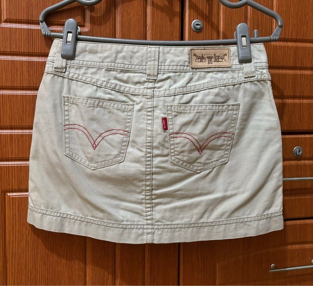 Levi's Khaki Mini Skirt Small 28-29" (Category: Skirts) located in Quezon City. Submitted by garagesale2026 (Listing ID 1465375899, Image 2). Description: - Used a few times - In very good condition - Original from Singapore - Length: 12" - Two back pockets and red stitching.