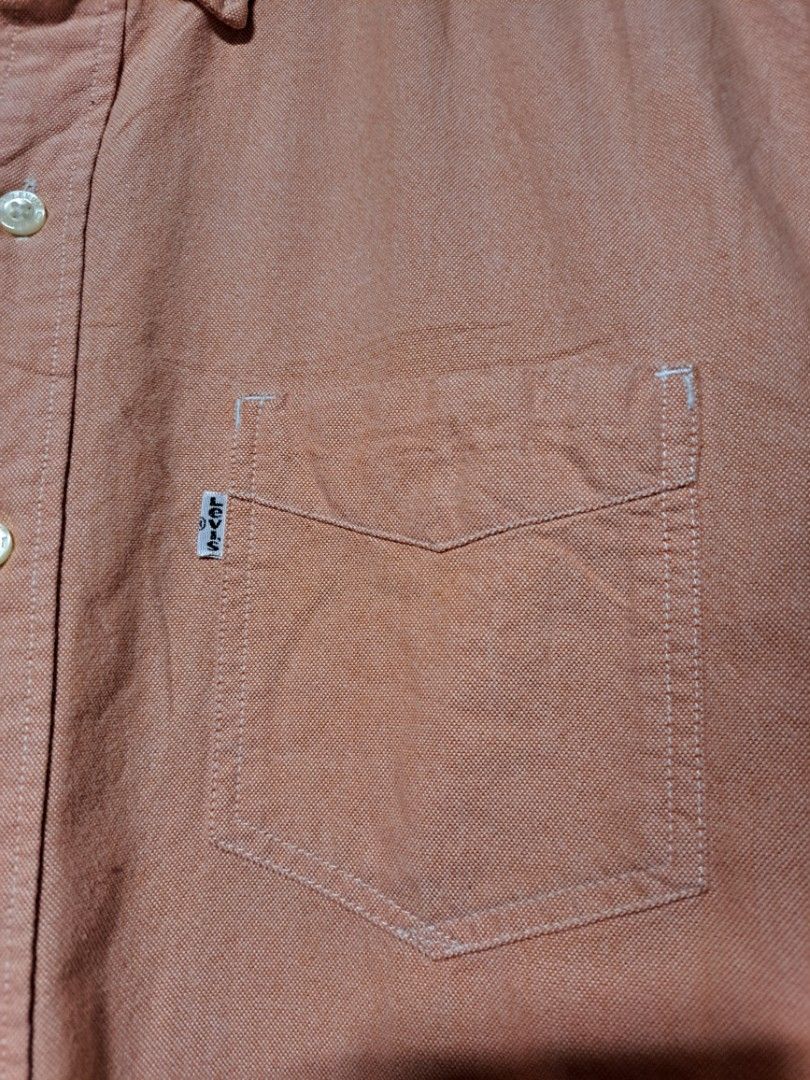 Levi's Peach Cotton Slim fit Button Down (Category: Formal Shirts) located in Dumaguete. Submitted by jayarbajad49160 (Listing ID 1465290377, Image 3). Description: Levi's Peach Cotton Slim fit Button Down Authentic/Original As new Condition Color rate:9.8/10 No issue Size Medium Width:22 Length:28 Loc dumaguete city visayas.