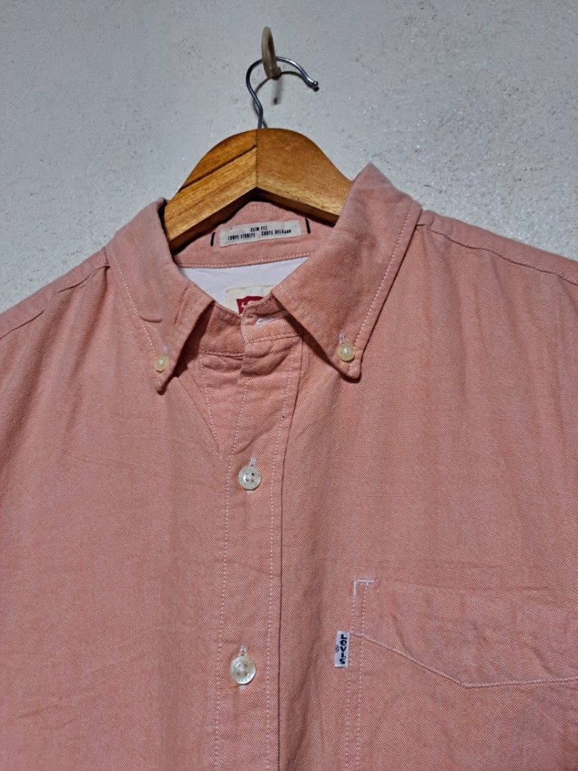 Levi's Peach Cotton Slim fit Button Down (Category: Formal Shirts) located in Dumaguete. Submitted by jayarbajad49160 (Listing ID 1465290377, Image 2). Description: Levi's Peach Cotton Slim fit Button Down Authentic/Original As new Condition Color rate:9.8/10 No issue Size Medium Width:22 Length:28 Loc dumaguete city visayas.