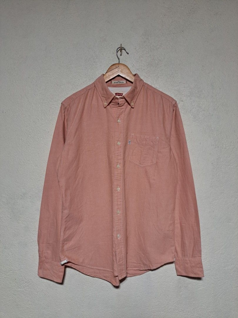 Levi's Peach Cotton Slim fit Button Down (Category: Formal Shirts) located in Dumaguete. Submitted by jayarbajad49160 (Listing ID 1465290377, Image 1). Description: Levi's Peach Cotton Slim fit Button Down Authentic/Original As new Condition Color rate:9.8/10 No issue Size Medium Width:22 Length:28 Loc dumaguete city visayas.
