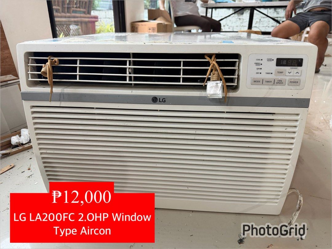 LG LA200FC 2.0HP Window Type Aircon (Category: Air Conditioning and Heating) located in San Pedro. Submitted by maylynart09522 (Listing ID 1465330229, Image 1). Description: - Brand/Model: LG LA200FC - Capacity: Powerful 2.0HP window type aircon - Controls: Digital panel with temperature display, timer, and fan speed settings - Design: Clean white outer casing with horizontal louver design - Condition/Inclusions: Heavy cooling capacity, ready to 