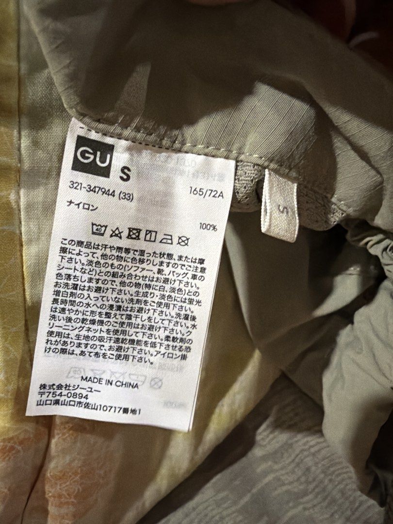 Light Beige Parachute Cargo Pants Drawstring Waist (Category: Trousers) located in Manila. Submitted by chris.ped (Listing ID 1465302399, Image 3). Description: Light beige utility cargo pants with a relaxed, baggy fit. Elastic waistband featuring a drawstring pull. Adjustable toggle hem cords at the ankles to switch up the silhouette. Two front slant pockets and a single back pocket with a flap closure. Lightweight synthetic material, smooth tex
