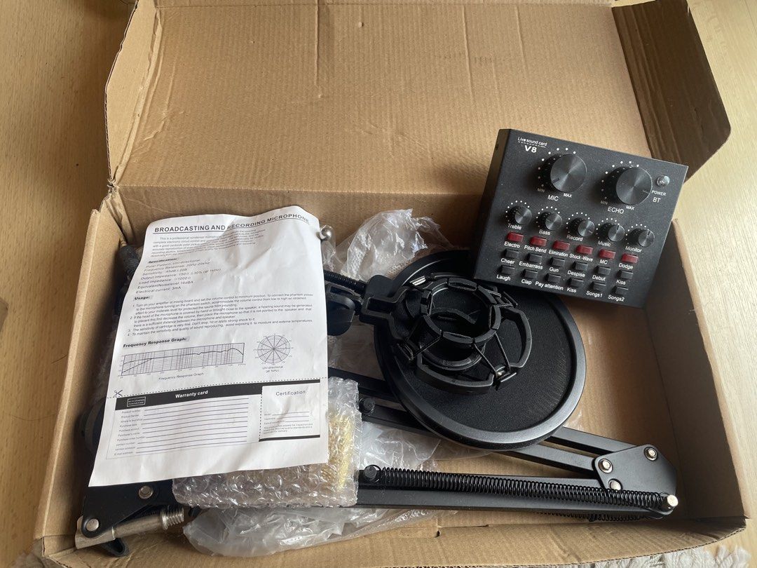 Live Broadcast Equipment Bundle with Microphone and Gimbal (Category: Microphones) located in Las Pinas. Submitted by amt1016 (Listing ID 1465201116, Image 2). Description: - Complete live streaming and content creation bundle - Includes V8 sound card, broadcast microphone, and suspension arm stand - Comes with pop filter and wireless clip-on microphones with case - Hohem iSteady smartphone gimbal included for stable video - All pictured items in