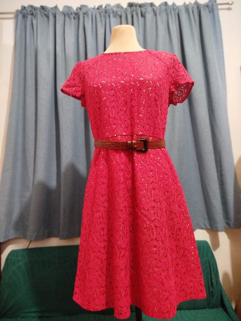 LOFT Red Lace Dress Size 0 (Category: Dresses) located in Quezon City. Submitted by plus4lessshop (Listing ID 1465181586, Image 1). Description: - Brand: LOFT - Color: Bright red - Material/Pattern: Floral lace with solid lining - Style: Short sleeves, round neckline, fitted waist, knee-length - Included: Thin brown belt - Occasion: Versatile for work, parties, or dates.