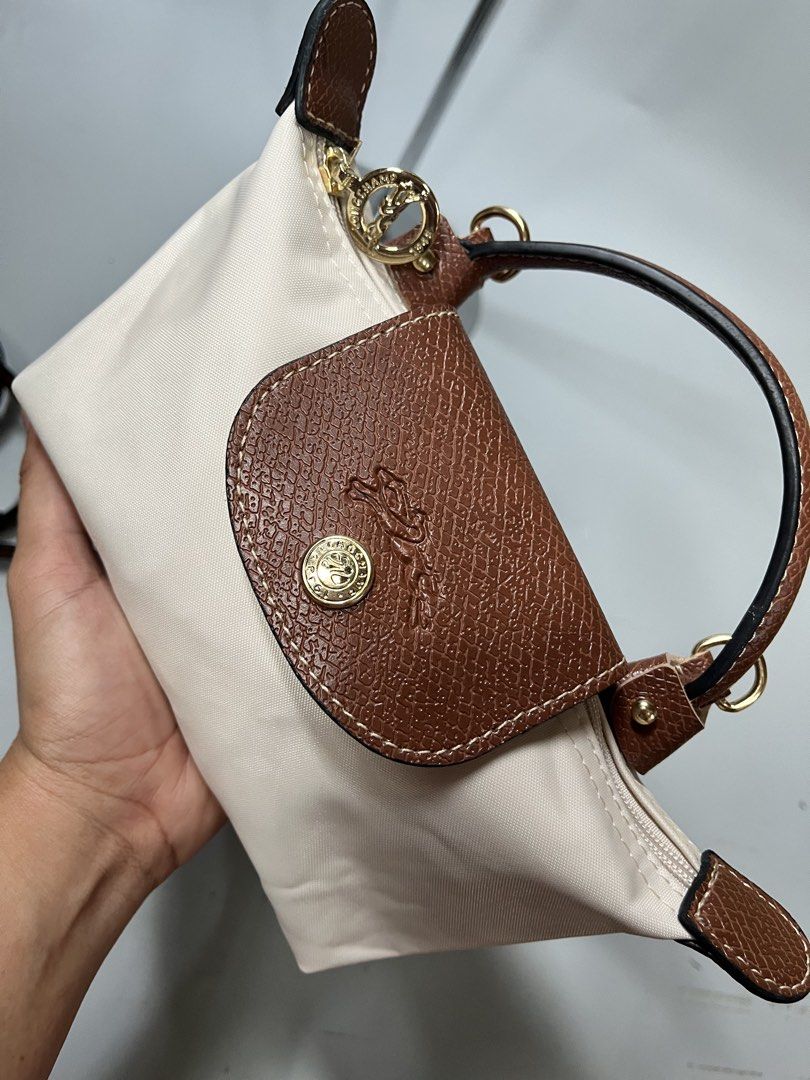Longchamp micro (Category: Luxury Accessories) located in San Jacinto. Submitted by kellysthrift_ (Listing ID 1465264447, Image 1). Description: Longchamp micro paper white.