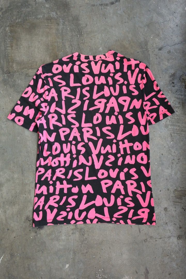 Louis Vuitton - Stephen Sprouse - Marc Jacobs - S/S 09 - Graffiti Tee (Category: Tshirts & Polo Shirts ) located in Manila. Submitted by graymatter_ (Listing ID 1465259138, Image 3). Description: Louis Vuitton - Stephen Sprouse - Marc Jacobs - S/S 09 - Graffiti Tee Tagged Size: M Condition: 9/10 Material: 50% Modal, 50% Cotton Made in: Italy Dimensions Length: 27 Width: 20.5 Shoulder: 18.5 Sleeve: 9.5 .