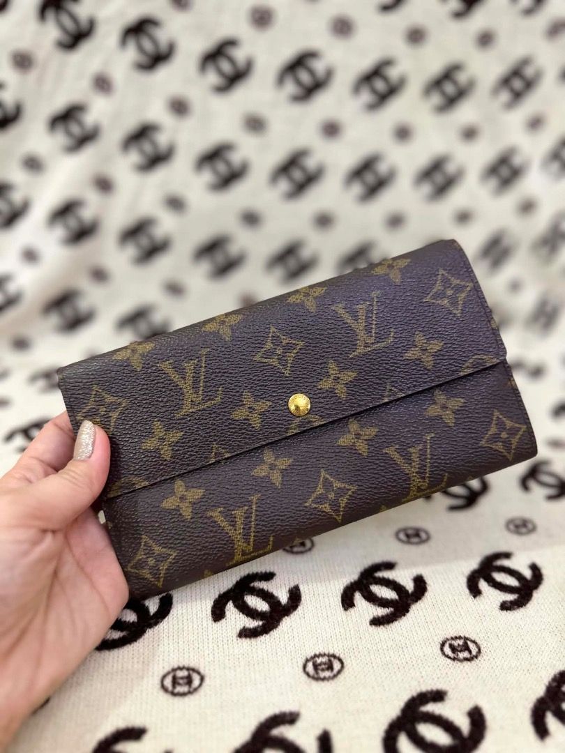 Louis Vuitton Monogram Long Wallet (Category: Luxury Bags & Wallets) located in San Pedro. Submitted by silverlion-4d46 (Listing ID 1465213522, Image 1). Description: - Authentic Classic Brown Monogram canvas - Secure gold-tone snap button front flap closure - Clean tan leather lining - Multiple card slots and compartments - Zippered coin pocket with original LV zipper pull - Excellent, well-maintained condition with smooth zipper action.