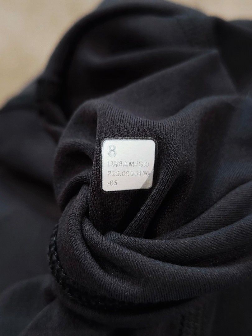 Lululemon Black Align High Rise Wrap Front Skirt (Category: Activewear) located in Muntinlupa City. Submitted by cezzy82 (Listing ID 1465231564, Image 3). Description: - Brand: Lululemon - Style: Athletic pleated skort with built-in shorts - Size: 8 (inner tag verified) - Color: Solid black - Rise: High-rise waistband - Ideal for: Tennis, running, and workouts - Condition: Excellent, clean, and gently used with no flaws.