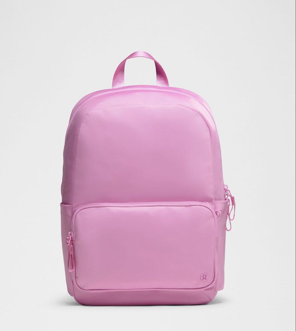 Lululemon Everyday Backpack 22L (Category: Backpacks) located in Muntinlupa City. Submitted by peachonlineshop (Listing ID 1465378179, Image 1). Description: - Brand: Lululemon - Color: Sweet Sorbet & Cherry ember - Material: Smooth, durable fabric - Design: Clean minimalist style with front zip pocket and brand logo - Storage: Large main compartment for all your daily essentials - Comfort: Top carry handle and adjustable shoulder straps - Versat
