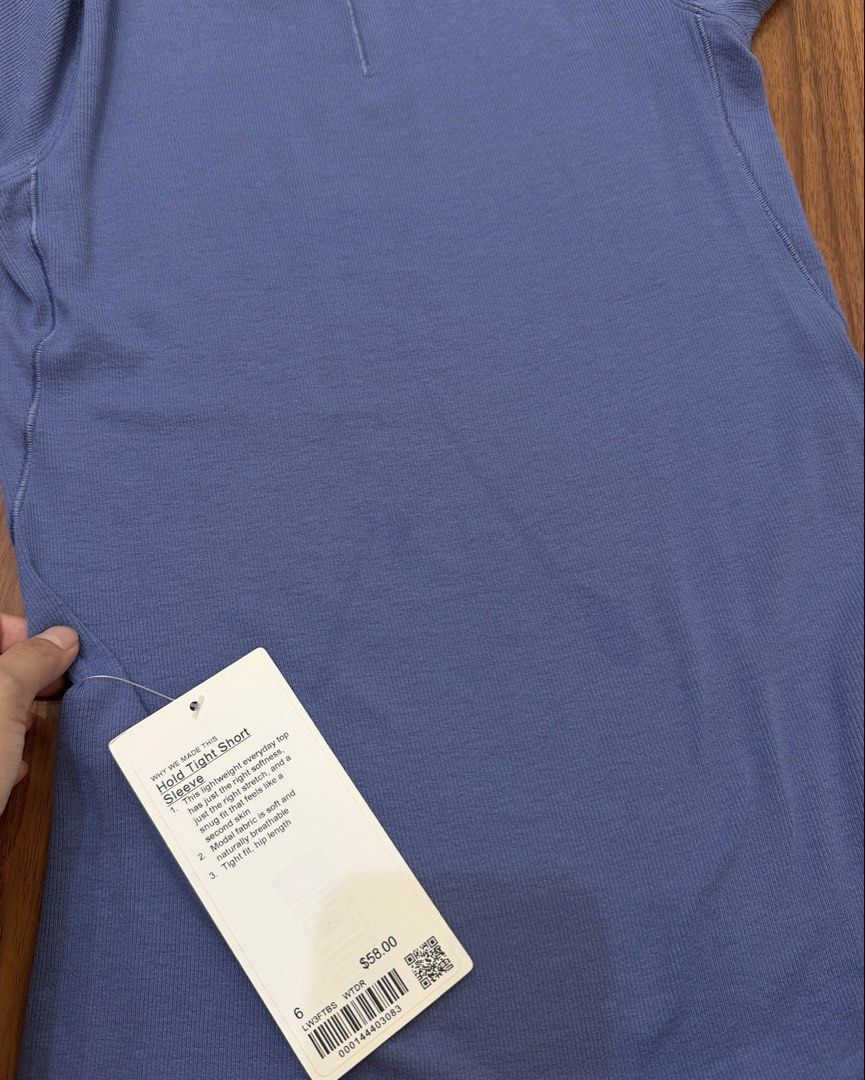 Lululemon Hold Tight Short Sleeve Size 6 (Category: Shirts) located in Manila. Submitted by angelll0123 (Listing ID 1465346052, Image 2). Description: - Brand: Lululemon - Style: Hold Tight Short Sleeve - Color: Blue - Size: 6 - Condition: Brand new with original tags ($58) - Material: Soft ribbed modal fabric with great stretch - Fit: Tight fit, hip length - Perfect for everyday wear.