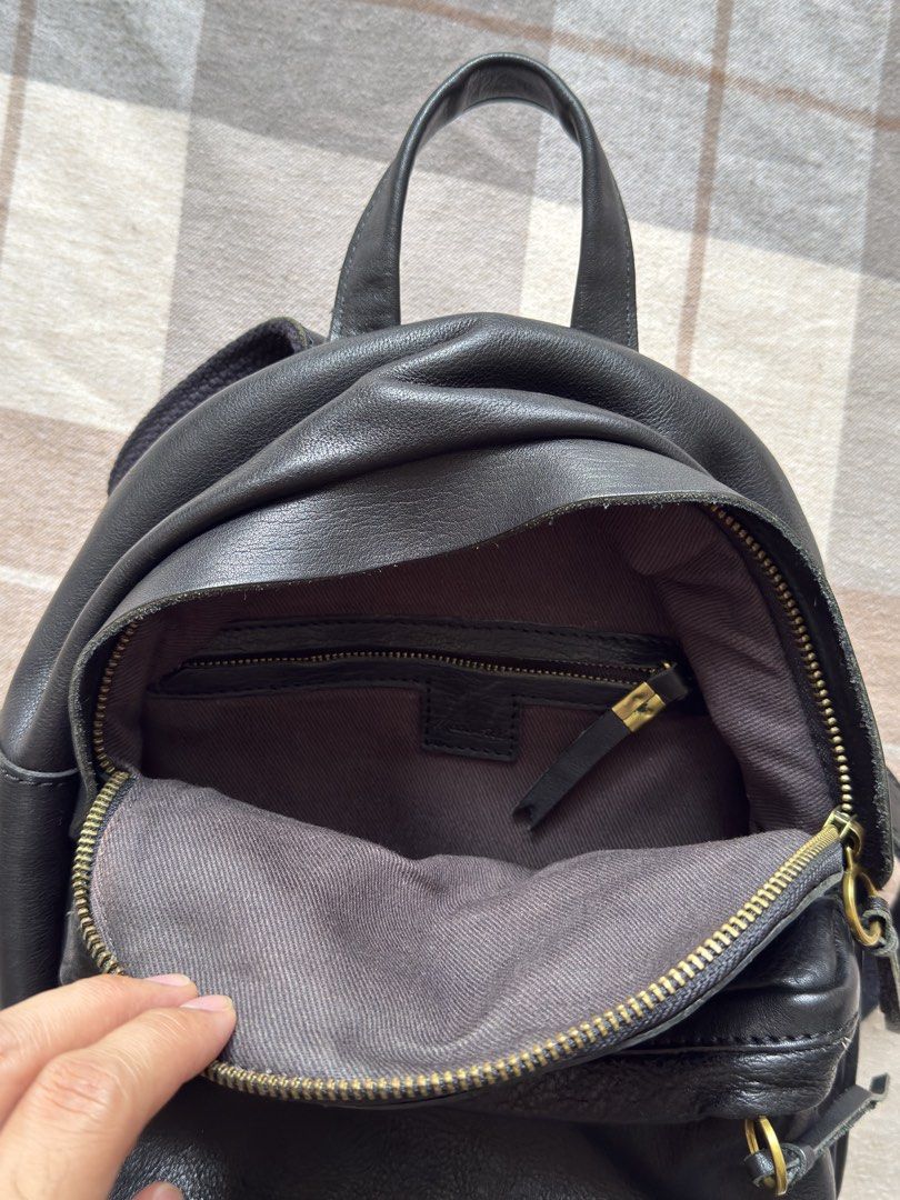 Madewell The Lorimer Mini Backpack (Category: Backpacks) located in Manila. Submitted by kuyamene (Listing ID 1465189784, Image 3). Description: Lightly used, like new condition Made of Italian vegetable-tanned leather specially washed for a beautiful patina. Hand-wrapped zipper pulls. Zip closure. Interior front and back pockets, exterior pocket. 4” handle drop. 9 7/8”H x 8 7/8”W x 3 1/2”D. Weight: 730g RFS decluttering.