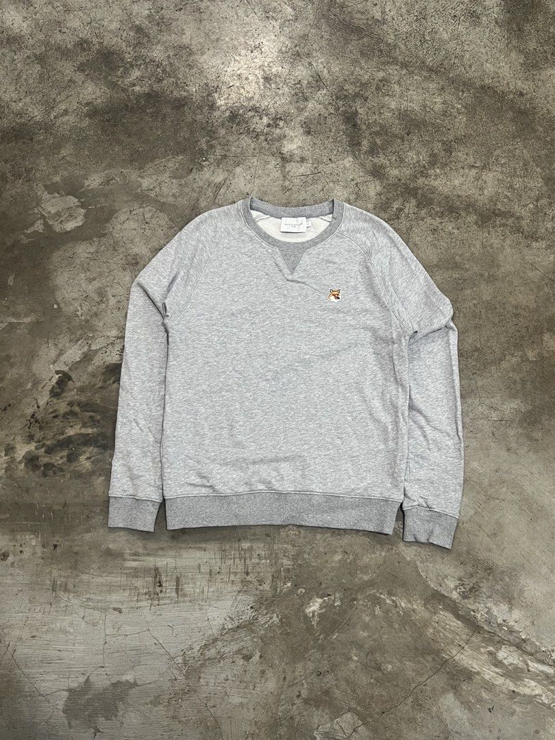 Maison Kitsuné Grey Fox Head Patch Sweatshirt (Category: Coats, Jackets and Outerwear) located in Naga. Submitted by nowhere_archive_shop (Listing ID 1465300286, Image 1). Description: Maison Kitsuné Fox Head Patch Classic Sweatshirt Size S On Tag 20/26 Excellent Condition No Issue DM.