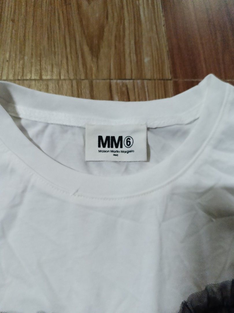 Maison Margiela (Category: Others Tops) located in Manila. Submitted by alwaysgoodzthrift (Listing ID 1465197533, Image 3). Description: Maison Margiela SZ small on tag as new no flaws.