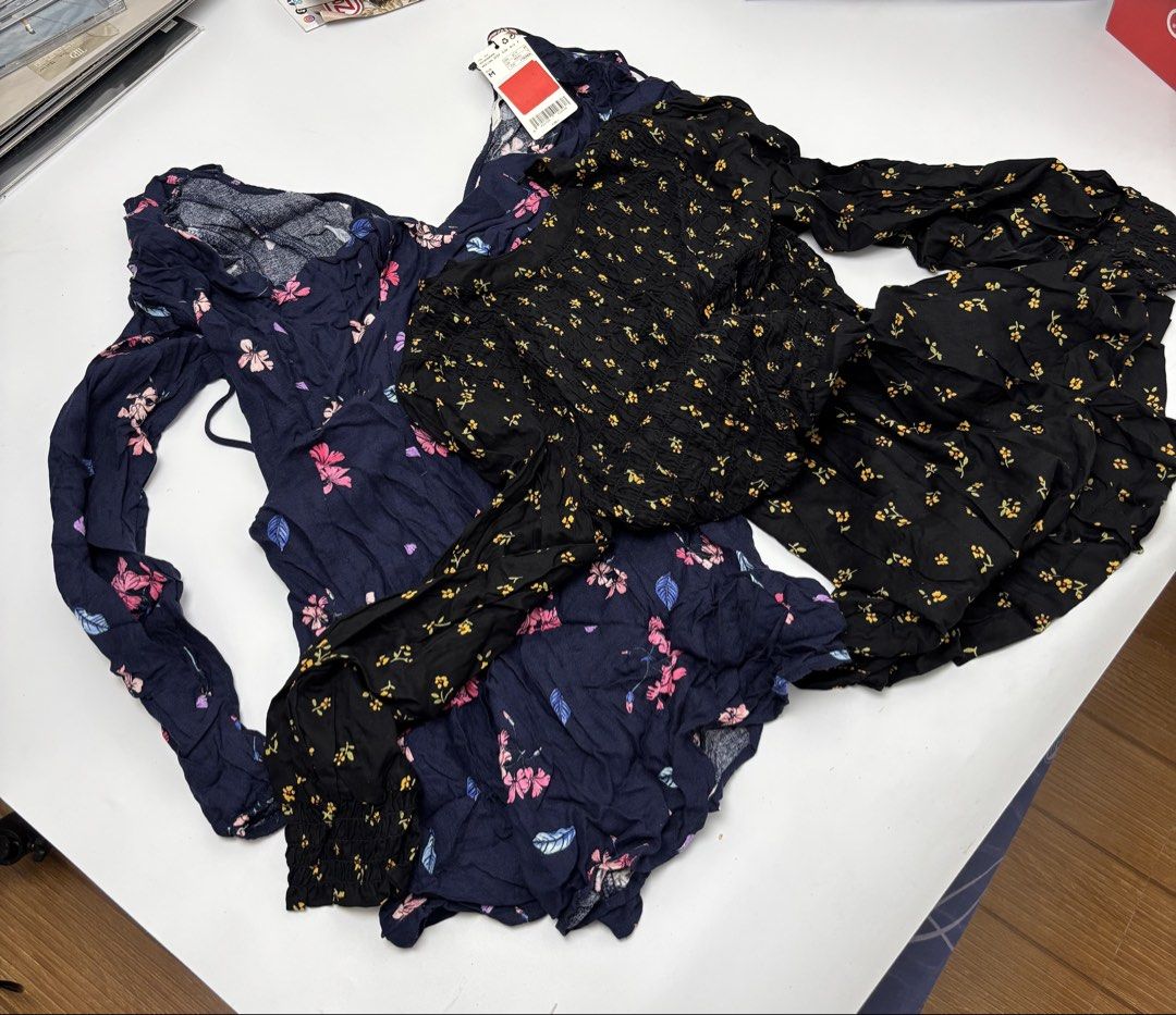 Mango and Asos short romper (Category: Blouses) located in Manila. Submitted by livfindsph (Listing ID 1465177773, Image 1). Description: - Bundle of 2 comfy floral tops for everyday wear - Navy blue top with pink floral print (brand new with tag still attached) - Black top with small yellow floral print - Features long sleeves and flattering gathered smocked fabric - Great wardrobe staples that are easy to style.