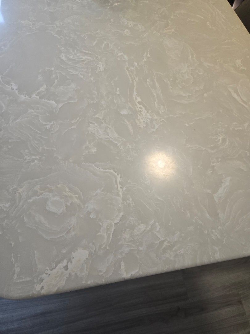 Marble pattern dining table set (Category: Tables & Sets) located in Singapore. Submitted by jojo123456 (Listing ID 1465176620, Image 2). Description: - Set includes: 1 rectangular dining table - Table: White marble-patterned top with a sturdy black metal pedestal base and elegant veining - Design: Sleek, modern style ideal for dining rooms or kitchen spaces - Condition: Excellent, ready for immediate use.