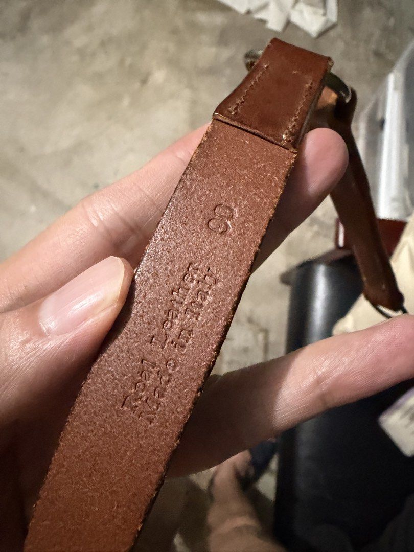 Margiela Belt (Category: Belts) located in Makati City. Submitted by homme.boy.plus (Listing ID 1465302784, Image 3). Description: Margiela Archival Belt Genuine Italian leather belt in rich brown Size 90 (32-34) with a unique Y-shape strap construction Beautiful vintage patina and wear marks that add character.