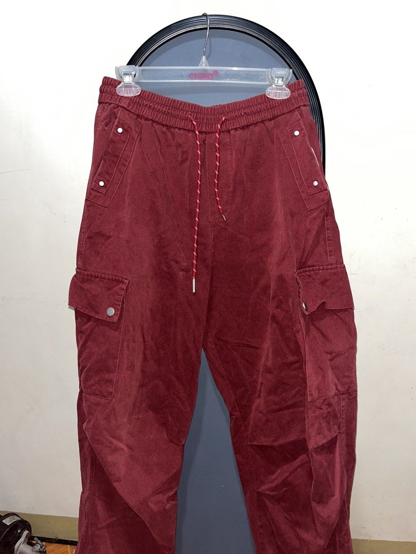 Maroon Cargo Pants with Drawstring Waist (Category: Jeans) located in Rizal. Submitted by bypc5678 (Listing ID 1465358194, Image 2). Description: - Color: Maroon - s28 to s34 - Casual streetwear, relaxed fit - red & white patterned drawstring.