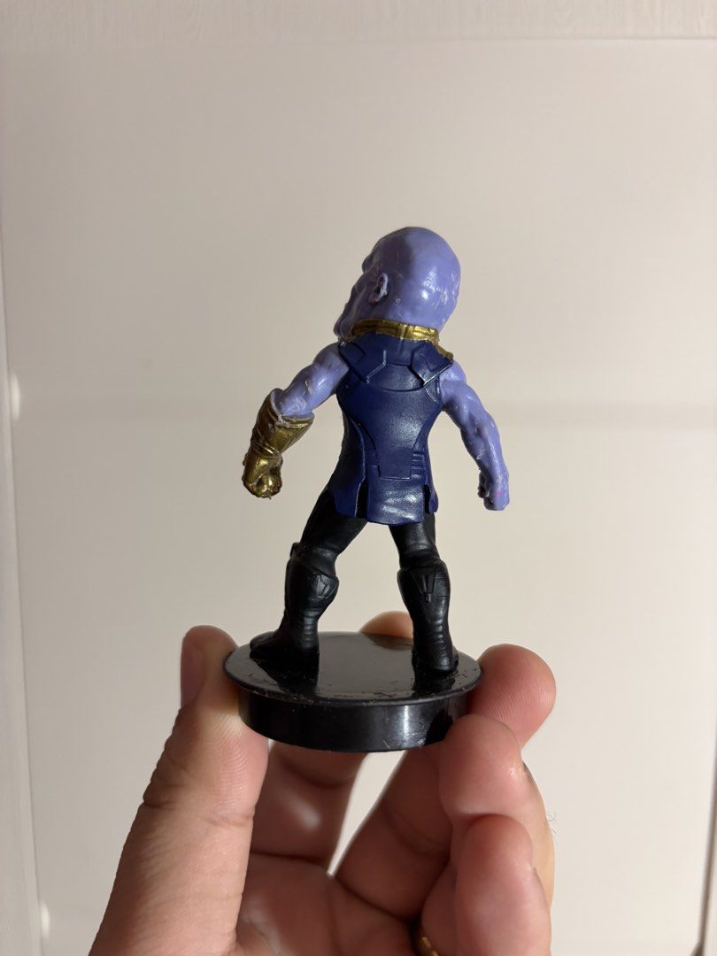 Marvel Avengers Thanos Bobblehead Figure 2018 (Category: Figurines & Statues) located in Plaridel. Submitted by moddedjarvis (Listing ID 1465171904, Image 2). Description: - Official 2018 Marvel Thanos collectible action figure - Fun big head design mounted on a sturdy black round base - Detailed blue and gold armor with the Infinity Gauntlet on the left hand - Made of solid plastic and stands upright - Official Marvel copyright text stamped unde
