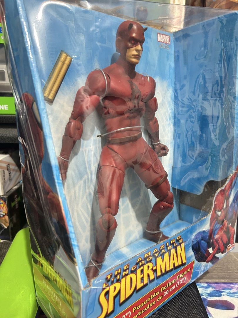 RUSH SALE !!! Marvel Daredevil 12 Inch Poseable Action Figure Boxed (Category: Figurines & Statues) located in Muntinlupa City. Submitted by capitalrg (Listing ID 1465238251, Image 3). Description: - 12-inch poseable Marvel Daredevil action figure in dynamic wired pose - never been played / NEW - Box shows noticeable wear and tear around the edges and corners.