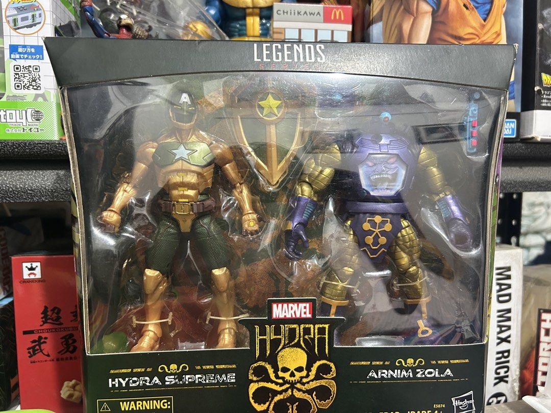 Marvel Legends Hydra Supreme and Arnim Zola 2-Pack (Category: Figurines & Statues) located in Muntinlupa City. Submitted by capitalrg (Listing ID 1465239233, Image 1). Description: - Brand: Hasbro Marvel Legends Series - Included Figures: Hydra Supreme and Arnim Zola - Accessories: Includes Hydra shield and more - Condition: Brand new, unopened in original window box - Perfect for: Marvel collections and display.