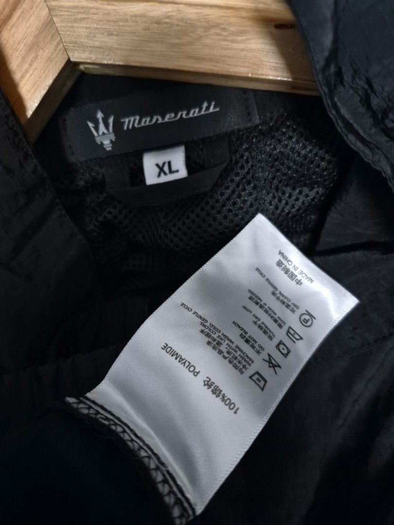 Maserati black windbreaker (Category: Coats, Jackets and Outerwear) located in Caloocan City. Submitted by jamestoledo30 (Listing ID 1465346227, Image 2). Description: Dimes LxW (in): 27 x 30 Condition : no issue Color Rate : 9.9/10 Like-new.