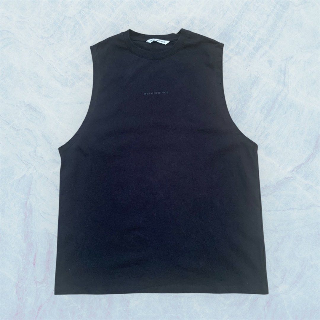 MASONPRINCE ARCHIVED TANK TOP (Category: Sleeveless) located in Paranaque City. Submitted by lesstash001 (Listing ID 1465295129, Image 1). Description: - Brand: MASONPRINCE - Color: Solid black - Fit: Relaxed fit with round ribbed collar - Details: large white graffiti lettering on upper back - Size: Size 1 tag with washing instructions - Material: Clean cotton fabric FIT ON LARGE 22 WIDTH 28 LENGTH IN EXCELLENT TO NEW CONDITION.