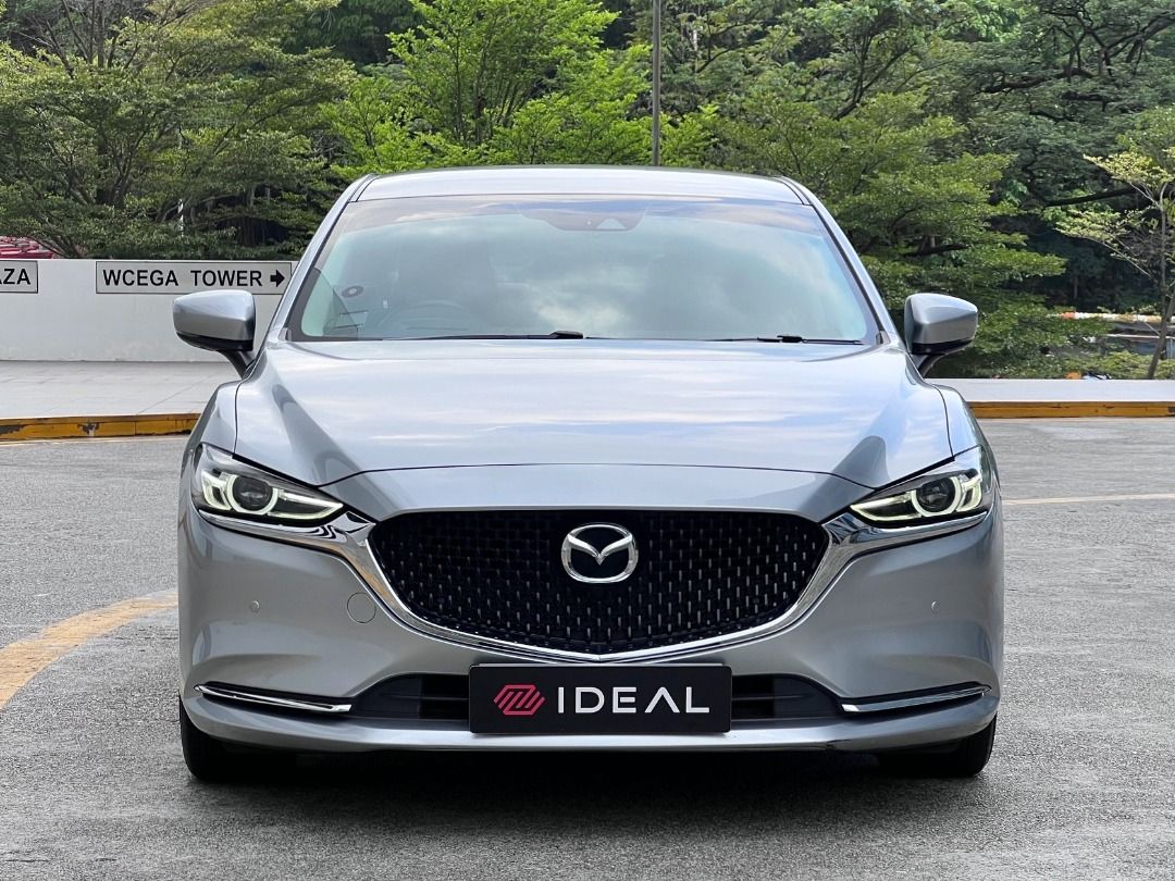 Mazda 6 Sedan 2.0 Executive (A) (Category: Used Cars) located in Singapore. Submitted by idealauto (Listing ID 1465259792, Image 2). Description: Features 2L 4 cylinder inline 16 valves DOHC SkyActiv-G 6 speed auto SkyActiv-drive, 162bhp/213nm, fuel capacity of 60L, massive boot space of 500L. Accessories Keyless engine start, cruise control, multi function steering wheel, Apple/Android Carplay, reverse camera, rear aircon, GPS, BT, heads up disp