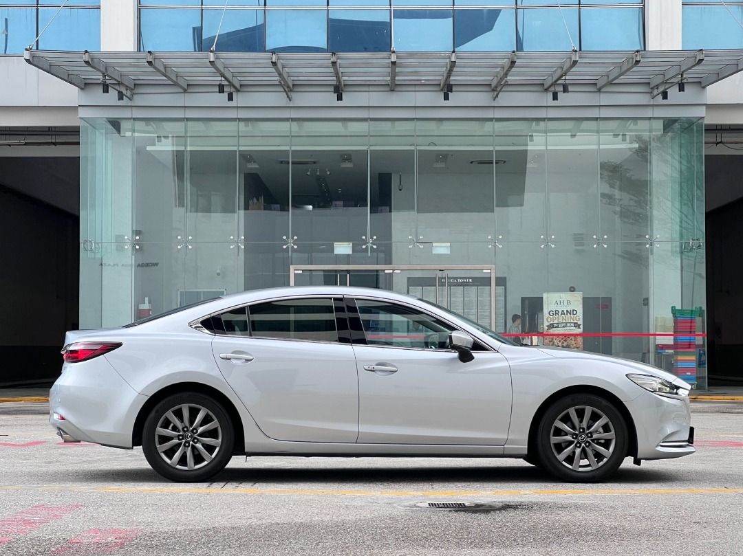 Mazda 6 Sedan 2.0 Executive (A) (Category: Used Cars) located in Singapore. Submitted by idealauto (Listing ID 1465259792, Image 3). Description: Features 2L 4 cylinder inline 16 valves DOHC SkyActiv-G 6 speed auto SkyActiv-drive, 162bhp/213nm, fuel capacity of 60L, massive boot space of 500L. Accessories Keyless engine start, cruise control, multi function steering wheel, Apple/Android Carplay, reverse camera, rear aircon, GPS, BT, heads up disp