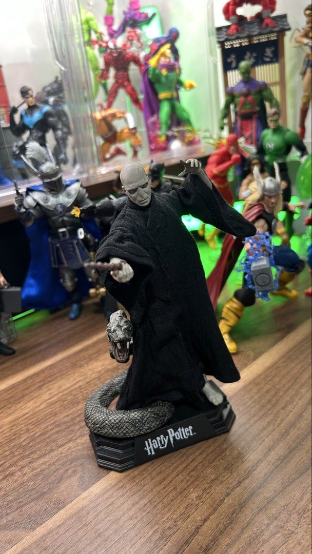 McFarlane Harry Potter Wizarding World Lord Voldemort (Category: Figurines & Statues) located in Davao. Submitted by haallouu (Listing ID 1465277590, Image 1). Description: Condition: BiB Issue: tattered soft goods on left elbow Comes with Base, Backdrop + support, Nagini.