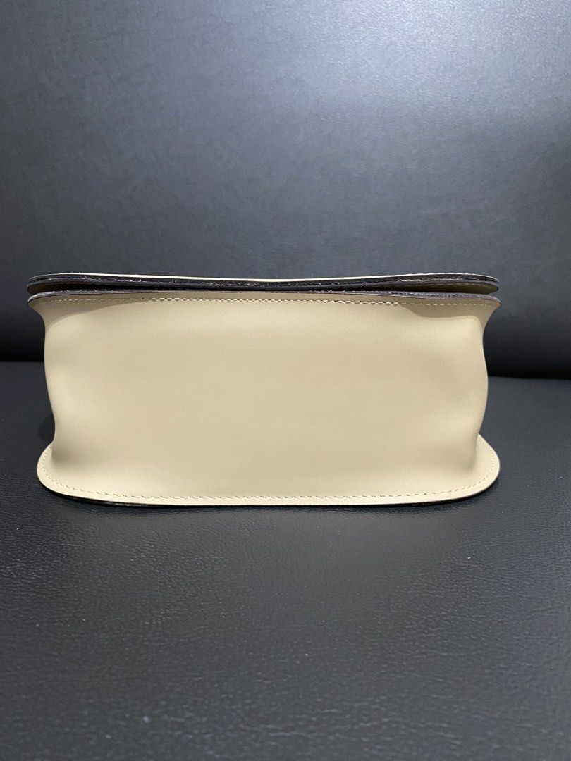 McLanee Sling Bag (Category: Cross-body Bags) located in Bulacan. Submitted by knklittlecloset (Listing ID 1465291950, Image 3). Description: With signs of use Please check detailed photos Still in excellent condition.