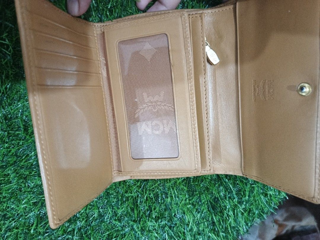MCM cognac med size (Category: Luxury Bags & Wallets) located in Manticao. Submitted by jiachloeyana (Listing ID 1465324637, Image 2). Description: in good condition medium trifold.