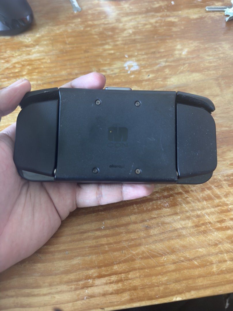 MCON IOS/ANDROID CONTROLLER (Category: Controllers) located in Singapore. Submitted by gobblersonline (Listing ID 1465227200, Image 2). Description: MCON hard to find in singapore Comes with original box, accesssories and one time use extra magsafe (for non magsafe phones) Hard to buy in singapore have to ship indirectly from the US RFS: got an ayn thor and decided i dont need this anymore.