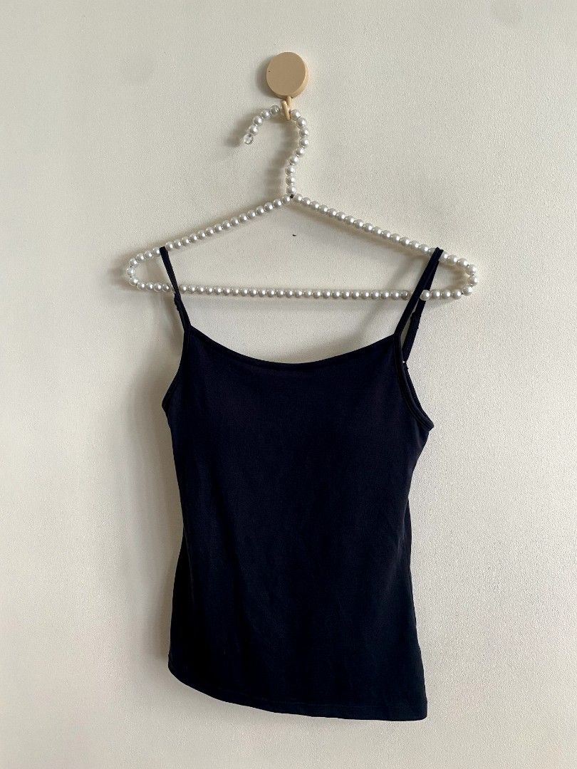 Medium Bra Top Black (Category: Others Tops) located in Castillejos. Submitted by lalainecloset22 (Listing ID 1465204922, Image 3). Description: - Brand: Uniqlo - Color: Black - Size: Medium - Material: 71% Polyester, 20% Cotton, 9% Spandex - Features built-in bra padding for ultimate comfort and support - Versatile design, perfect for layering or standalone casual wear.
