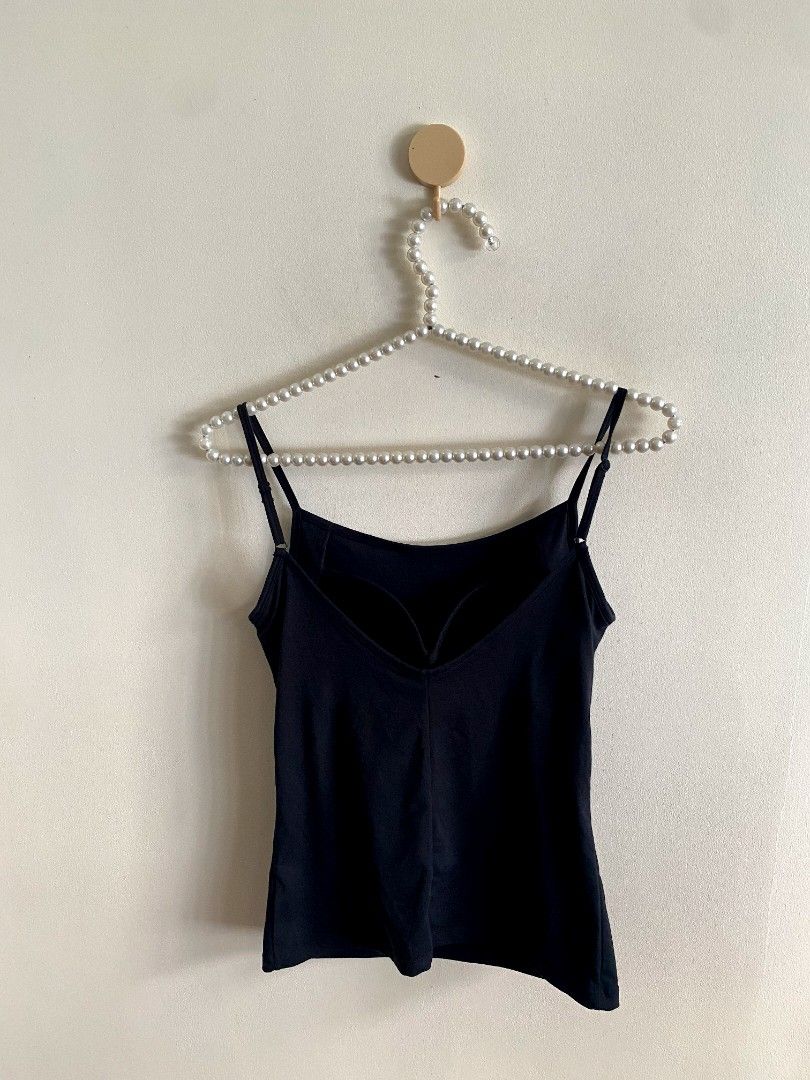 Medium Bra Top Black (Category: Others Tops) located in Castillejos. Submitted by lalainecloset22 (Listing ID 1465204922, Image 2). Description: - Brand: Uniqlo - Color: Black - Size: Medium - Material: 71% Polyester, 20% Cotton, 9% Spandex - Features built-in bra padding for ultimate comfort and support - Versatile design, perfect for layering or standalone casual wear.
