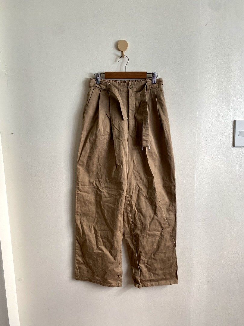 Medium GU Chio High Waisted Volume Pants (Category: Other Bottoms) located in Castillejos. Submitted by lalainecloset22 (Listing ID 1465239780, Image 3). Description: - Brand: GU (Uniqlo sister brand) - Style: High-waisted volume / wide-leg pants - Size: Medium (M) - Color: Khaki / Tan brown - Material: 98% Cotton, 2% Spandex (comfortable with slight stretch) - Features: Front pleats, built-in waist belt detail, elasticized back waistband - Condi