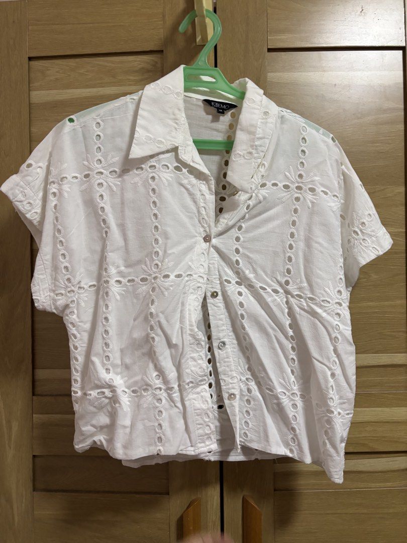 MEMO White Eyelet Button-Up Blouse Size M (Category: Blouses) located in Cebu City. Submitted by teveschels38656 (Listing ID 1465334099, Image 1). Description: - Brand: MEMO - Size: Medium to Large - Design: Short sleeves, lapel collar, and front button closure - Details: All-over eyelet embroidery with cut-out floral patterns - Fit: Relaxed fit and lightweight material - Condition: Excellent.