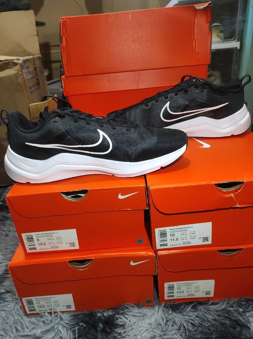 Men's Nike Downshifter 12 Size 12 (Category: Sneakers) located in Laoag. Submitted by pa-010 (Listing ID 1465235669, Image 2). Description: - Black Nike Downshifter 12 running shoes - White Nike swoosh and sole - Secure lace-up closure - Perfect for running or everyday casual wear - Comes with original Nike box Location: Ilocos Norte Payment First before shipping Buyer shoulders sf .