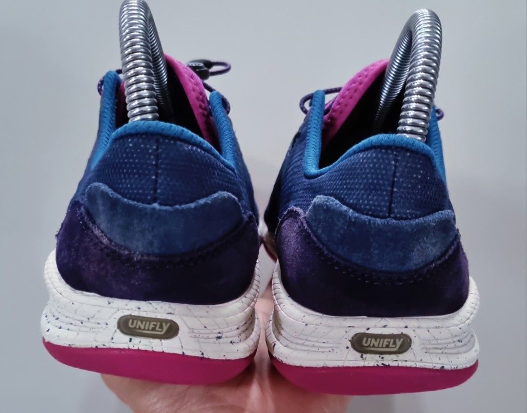 Merrell Unifly Blue Pink Athletic Sneakers (Category: Sneakers) located in Danao, Cebu. Submitted by CaxeCart (Listing ID 1465227467, Image 3). Description: Merrell athletic shoes in blue and pink. Quick lace toggle system on top. White speckled midsole with UniFly technology. Bright pink rubber outsole for grip. Mesh upper material with suede heel panels. Comfortable fit for outdoor walks or casual runs. Easy to slip on and adjust..