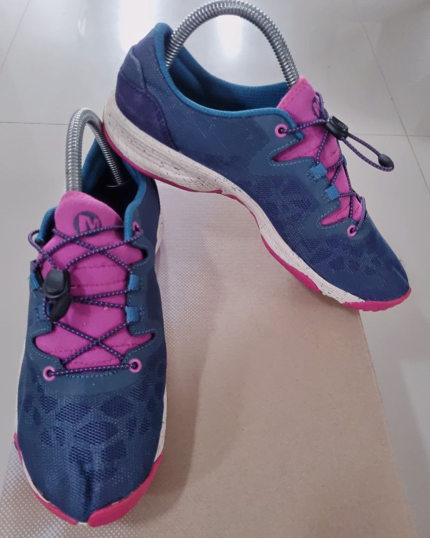 Merrell Unifly Blue Pink Athletic Sneakers (Category: Sneakers) located in Danao, Cebu. Submitted by CaxeCart (Listing ID 1465227467, Image 1). Description: Merrell athletic shoes in blue and pink. Quick lace toggle system on top. White speckled midsole with UniFly technology. Bright pink rubber outsole for grip. Mesh upper material with suede heel panels. Comfortable fit for outdoor walks or casual runs. Easy to slip on and adjust..