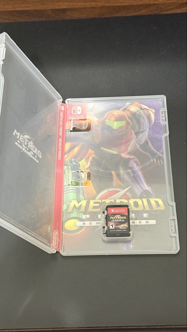 Metroid Prime Remastered Nintendo Switch Physical Game (Category: Nintendo) located in Santiago. Submitted by jaycastillooo (Listing ID 1465200660, Image 2). Description: - Game: Metroid Prime Remastered (Nintendo Switch, USA Region) - Condition: case and cover art intact - Features: Stunning visuals and tight controls, ESRB Rated T for Teen - Delivery: Fast shipping or local meetup available - Action: Drop a message if interested!.