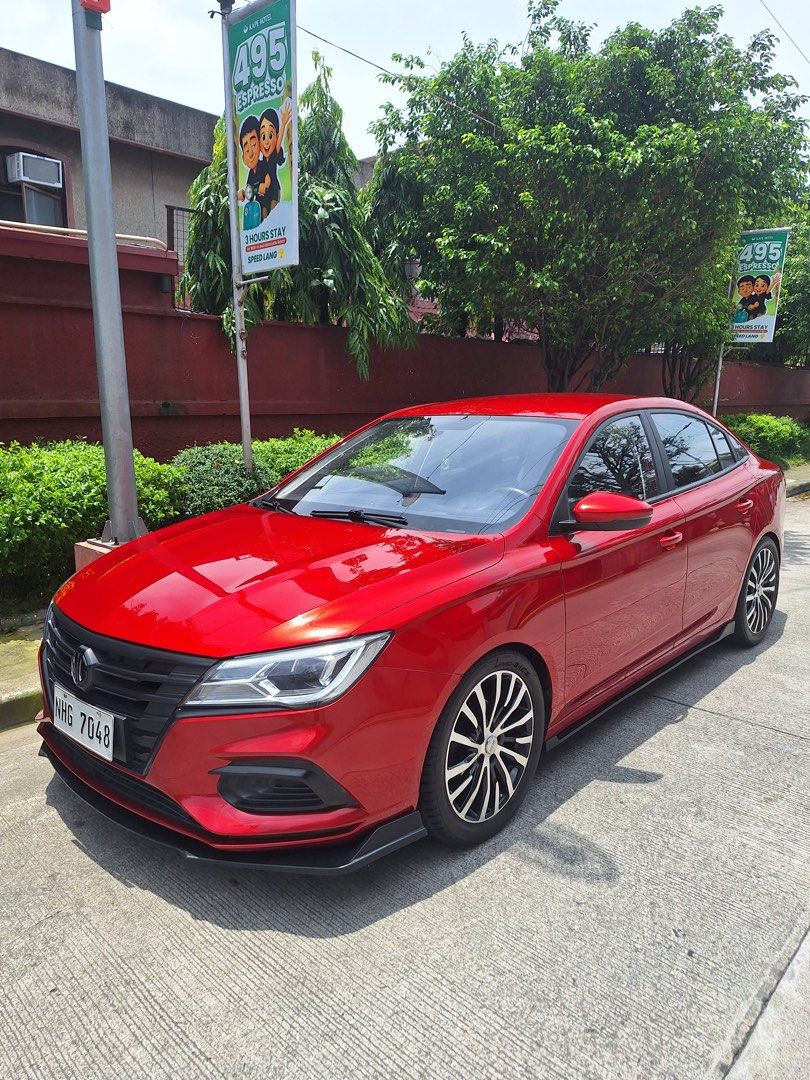 MG 5 (Category: Used Cars) located in Caloocan City. Submitted by eric910 (Listing ID 1465185376, Image 1). Description: 2023 MG5 (MORRIS GARAGES) 19K MILEAGE PRISTINE CONDITION/LIKE BRAND NEW UPGRADES: -18 INCH BRAND NEW RIMS -235/45/18R BRAND NEW LENSO TIRES -MG5 BODY KIT: FRONT LIP , SIDE SKIRTS , REAR SPATS -5 INCH TIP 12” BLACK TITANIUM MUFFLER -NEW LED WHITE HEADLIGHTS LOW AND HIGH BEAM -WHITE LED INTERIOR LIGHTS + PLATES -CHROME DELETE/MAT